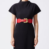 Red elastic-backed belt with gold distended buckle